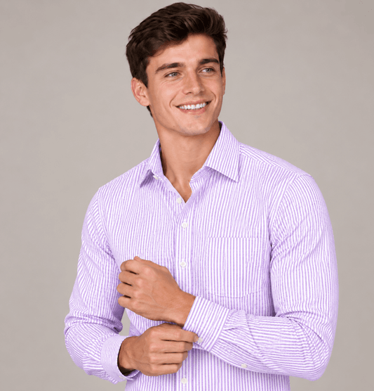 Man wearing a classic lavender stripe dress shirt with black tailored trousers, a brown leather belt, and brown loafers.