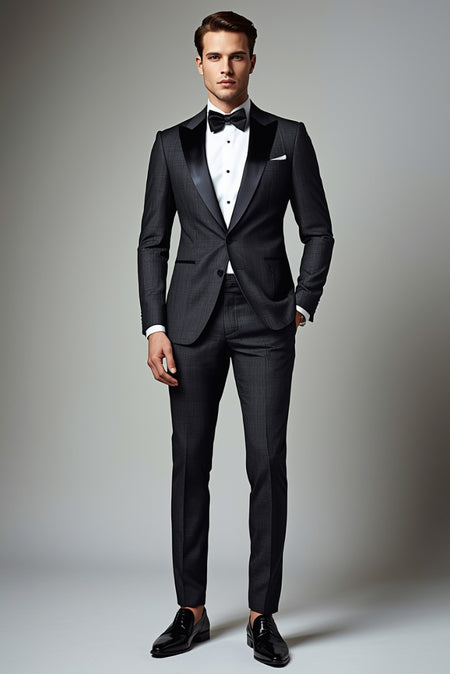 Mens black tuxedo with satin lapels and bow tie – classic formal evening suit