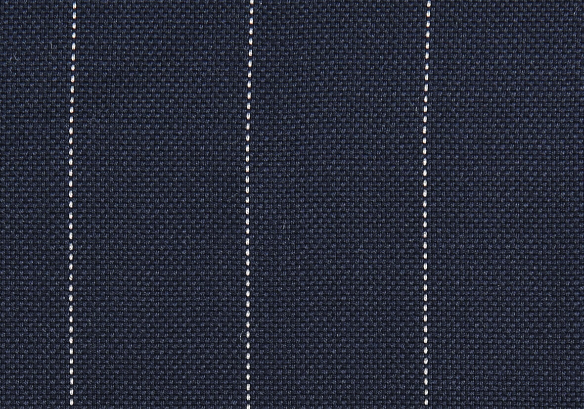Navy blue pinstripe suiting fabric with fine white vertical stripes and textured woven pattern for custom tailored business suits.
