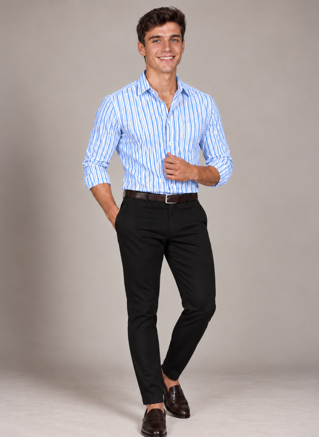 Men's classic blue stripe dress shirt styled with black trousers and brown loafers, showcasing a tailored fit and crisp vertical stripe pattern.