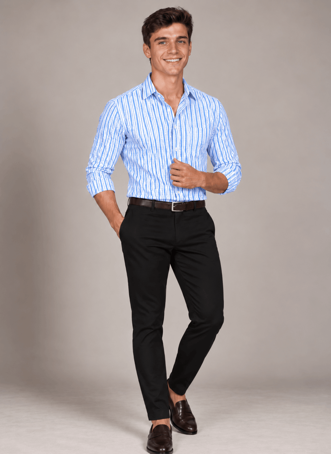 Men's classic blue stripe dress shirt styled with black trousers and brown loafers, showcasing a tailored fit and crisp vertical stripe pattern.